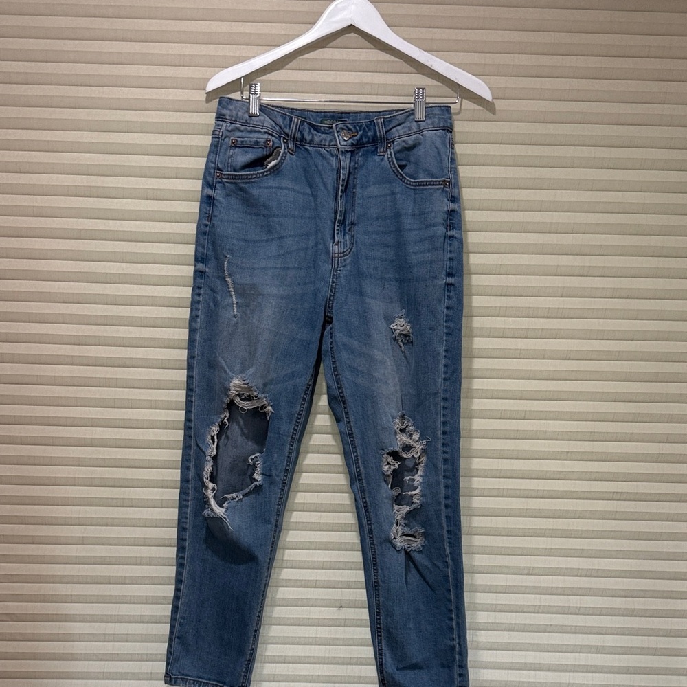 Distressed Blue Jeans